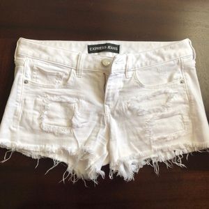 Low rise white frayed denim shorts
